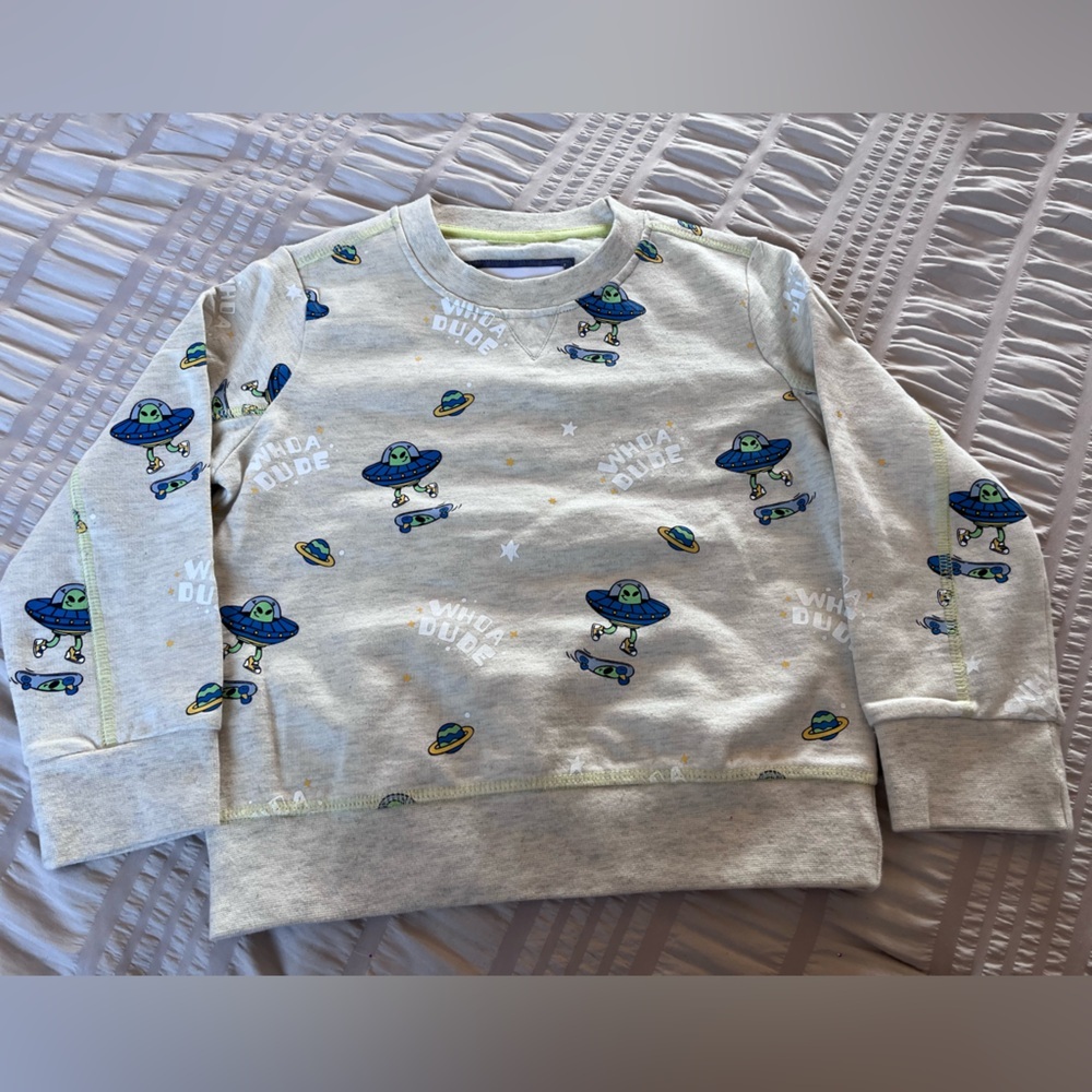 Sovereign Code Cream Sweatshirt with Blue and Green Accents